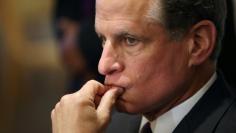 FILE PHOTO: Dallas Federal Reserve Bank President Robert Kaplan gestures during a news conference after of the True Economic Talks event in Mexico City, Mexico, July 14, 2017. REUTERS/Edgard Garrido/File Photo