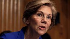 Senator Elizabeth Warren (D-MA) questions Alex Azar (not pictured) during a Senate Health, Education, Labor and Pensions Committee hearing on his nomination to be Health and Human Services secretary on Capitol Hill in Washington, U.S., November 29, 2017.