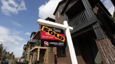 FILE PHOTO - Sold homes are seen in the southwest area of Portland, Oregon March 20, 2014. REUTERS/Steve Dipaola