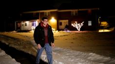 Munoz from El Salvador arrives to his home in Red Bank, New Jersey