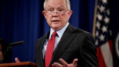 FILE PHOTO: U.S. Attorney General Jeff Sessions speaks during a news conference to discuss "efforts to reduce violent crime" at the Department of Justice in Washington, U.S., December 15, 2017.  REUTERS/Joshua Roberts/File Photo