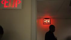 FILE PHOTO: A job seeker departs the Dr. Martin Luther King Jr. career fair held by the New York State department of Labor in New York, April 12, 2012. REUTERS/Lucas Jackson 