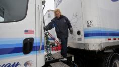 Freight driver Sharon Bondy finishes uncoupling her truck and trailer after returning to the Con-way Freight trucking yard from her deliveries in Romulus, Michigan, November 19, 2014.  REUTERS/Rebecca Cook