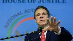 New York Gov. Cuomo speaks to guests during the National Action Network Dr. Martin Luther King, Jr. Day Public Policy Forum in the Harlem borough of New York City