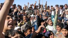 People chant slogans as they take part in an anti-U.S. rally in Chaman