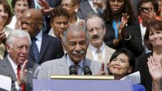 FILE PHOTO: Congressman John Conyers (D-MI) speaks at an event celebrating the 50th anniversary of the Voting Rights Act of 1965 in Washington July 30, 2015. Conyers, the oldest and longest serving member of Congress, voted on the 1965 VRA. REUTERS/Gary 