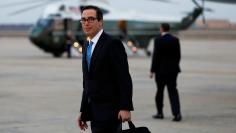 FILE PHOTO: U.S. Treasury Secretary Steve Mnuchin arrives at Joint Base Andrews