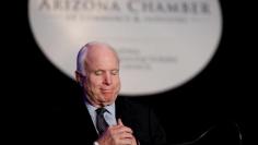 United States Senator John McCain (R-AZ) listens to applause after announcing he will seek re-election for his seat during a speech to the Arizona Chamber of Commerce and Industry in Phoenix, Arizona April 7, 2015.  REUTERS/Nancy Wiechec