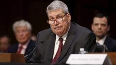 FILE PHOTO: Valeant CEO Michael Pearson testifies about price spikes in decades-old pharmaceuticals before a hearing of the U.S. Senate Special Committee on Aging on Capitol Hill in Washington, U.S. April 27, 2016. REUTERS/Jonathan Ernst 