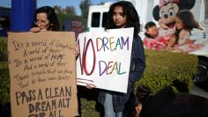 DACA recipients and supporters protest for a clean Dream Act outside Disneyland in Anaheim