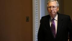 U.S. Senate Majority Leader Mitch McConnell (R-KY) walks back to his office after voting for a continuing resolution and end a three-day government shutdown on Capitol Hill in Washington, U.S., January 22, 2018. REUTERS/Leah Millis