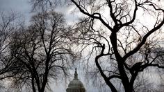 Clouds pass over the U.S. Capitol at the start of the third day of a shut down of the federal government in Washington