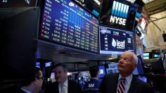 Leaf Group CEO Sean Moriarty and Chairman of the Board James Quandt walk on the trading floor at the New York Stock Exchange (NYSE) in Manhattan, New York City, U.S., February 27, 2017. REUTERS/Andrew Kelly 