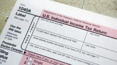 A tax form is pictured on tax deadline day at the main Post Office in New York