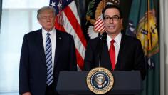 FILE PHOTO: Treasury Secretary Steve Mnuchin speaks during a signing ceremony with President Donald Trump at the Treasury Department in Washington, U.S., April 21, 2017.  REUTERS/Aaron P. Bernstein