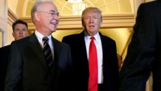 U.S. President Donald Trump (C) and Health and Human Services Secretary Tom Price (L) enter the U.S. Capitol in Washington, U.S., March 21, 2017. REUTERS/Kevin Lamarque