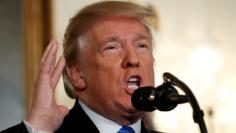 FILE PHOTO - U.S. President Donald Trump speaks during an address from the White House in Washington, U.S., December 6, 2017.  REUTERS/Kevin Lamarque/File Picture 