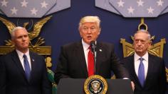 U.S. President  Donald Trump (C) dellivers remarks after attending a swearing-in ceremony for Defense Secretary James Mattis (R) with Vice President Mike Pence at the Pentagon in Washington, U.S., January 27, 2017. REUTERS/Carlos Barria 