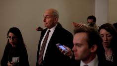 White House Chief of Staff John Kelly speaks with reporters at the U.S. Capitol in Washington