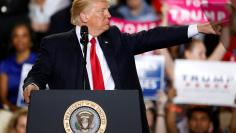 FILE PHOTO: U.S. President Donald Trump appears on stage at a rally in Harrisburg, Pennsylvania, U.S. April 29, 2017.   REUTERS/Carlo Allegri/File Photo