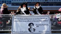 Women dressed as suffragettes attend the Women's March rally in Las Vegas, Nevada, U.S. January 21, 2018. REUTERS/Steve Marcus