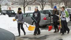 Volunteers, led by the Old First Ward Community Association, gather for a shovel brigade coordinated by the City in Buffalo, New York November 22, 2014 in an effort to assist with shoveling as the city continues to clean up after a massive snowstorm.    R