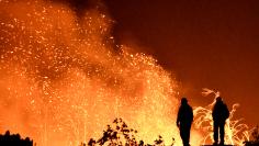 Firefighters keep watch on the Thomas wildfire in the hills and canyons outside Montecito, California, U.S., December 16, 2017. REUTERS/Gene Blevins 