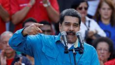 Venezuela's President Nicolas Maduro speaks during a rally to commemorate the 60th anniversary of the end of Venezuelan dictator Marcos Perez Jimenez's regime in Caracas, Venezuela January 23, 2018. REUTERS/Marco Bello