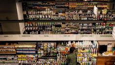 FILE PHOTO: Customers shop at a Whole Foods store in New York City, U.S., August 28, 2017.   REUTERS/Brendan McDermid  