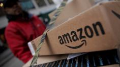 FILE PHOTO - Amazon boxes are seen stacked for delivery in Manhattan, New York, U.S. on January 29, 2016. REUTERS/Mike Segar/File Photo