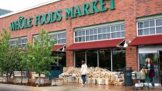 Customers leave the Whole Foods Market in Boulder, Colorado May 10, 2017.  REUTERS/Rick Wilking 