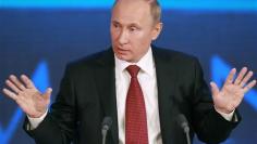 Putin backs tit-for-tat response to U.S. rights law