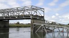 Truck crash caused Washington state bridge collapse: officials