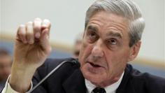 FBI director says all surveillance complies with U.S. law