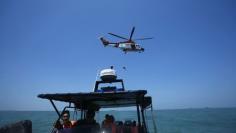 Overloaded boat sinks off Malaysia, 34 Indonesians missing, three dead