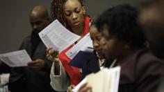 U.S. jobless claims hit more than eight-year low, but home sales tumble