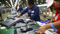 U.S. job growth cools, unemployment rate rises