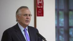 Fed's Fisher, Plosser push for earlier rate hike