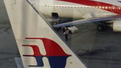 Tragedy-hit Malaysia Airlines to lose 6,000 jobs in bold revamp