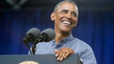 Amid foreign crises, Obama takes solace in U.S. economic turnaround