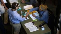U.S. hiring accelerates, jobless rate hits six-year low