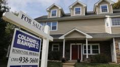 U.S. services sector growth slows, pending home sales miss forecast