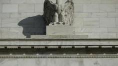 Fed ends bond buying, shows confidence in U.S. recovery