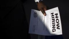 U.S. jobless claims rise, but underlying labor market trends firming