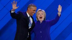 U.S. President Obama and Democratic presidential nominee Clinton appear onstage together after his speech on the third night at the Democratic National Convention in Philadelphia