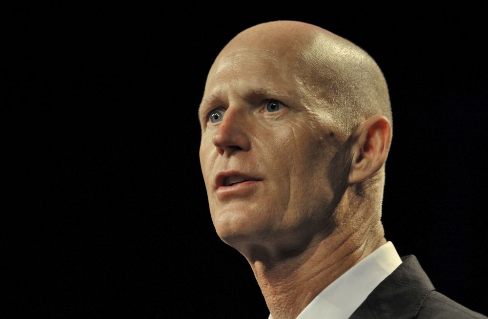 Rick Scott, 63