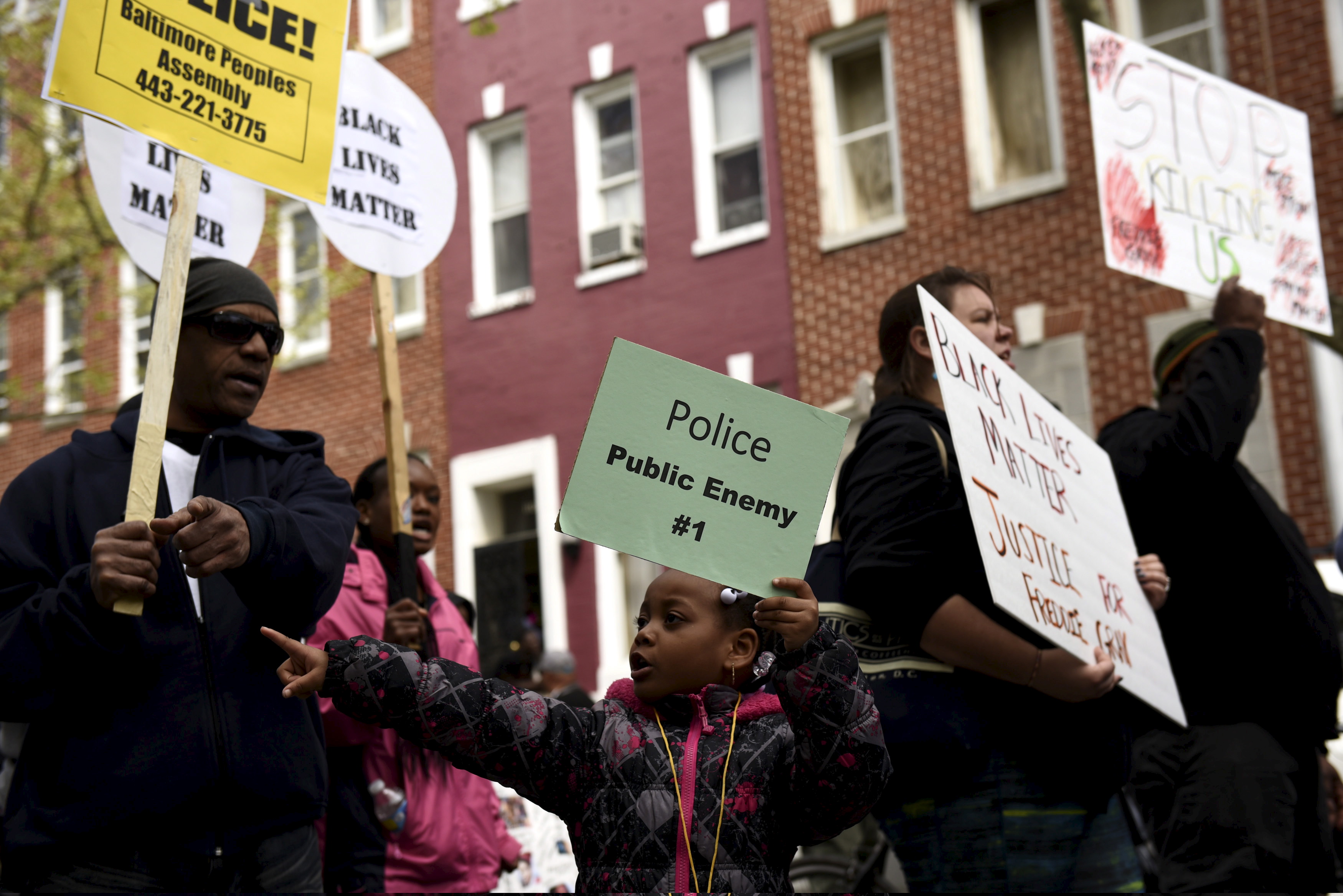 Demonstrators gather in front of Baltimore Police Department Western District station to protest against the death in police custody of Freddie Gray in Baltimore 