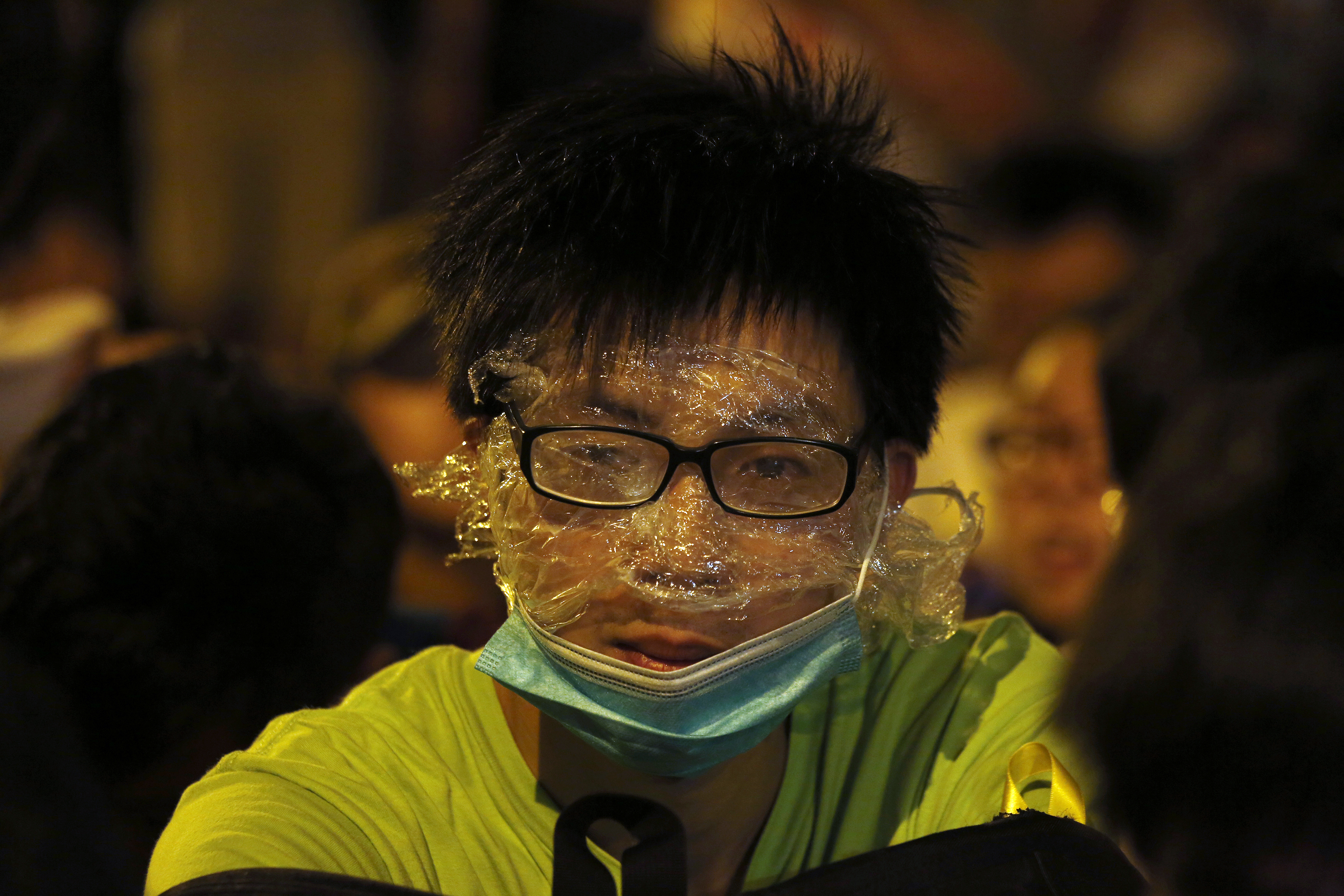 A protester wearing rudimentary protection against pepper spray is pictured in Hong Kong