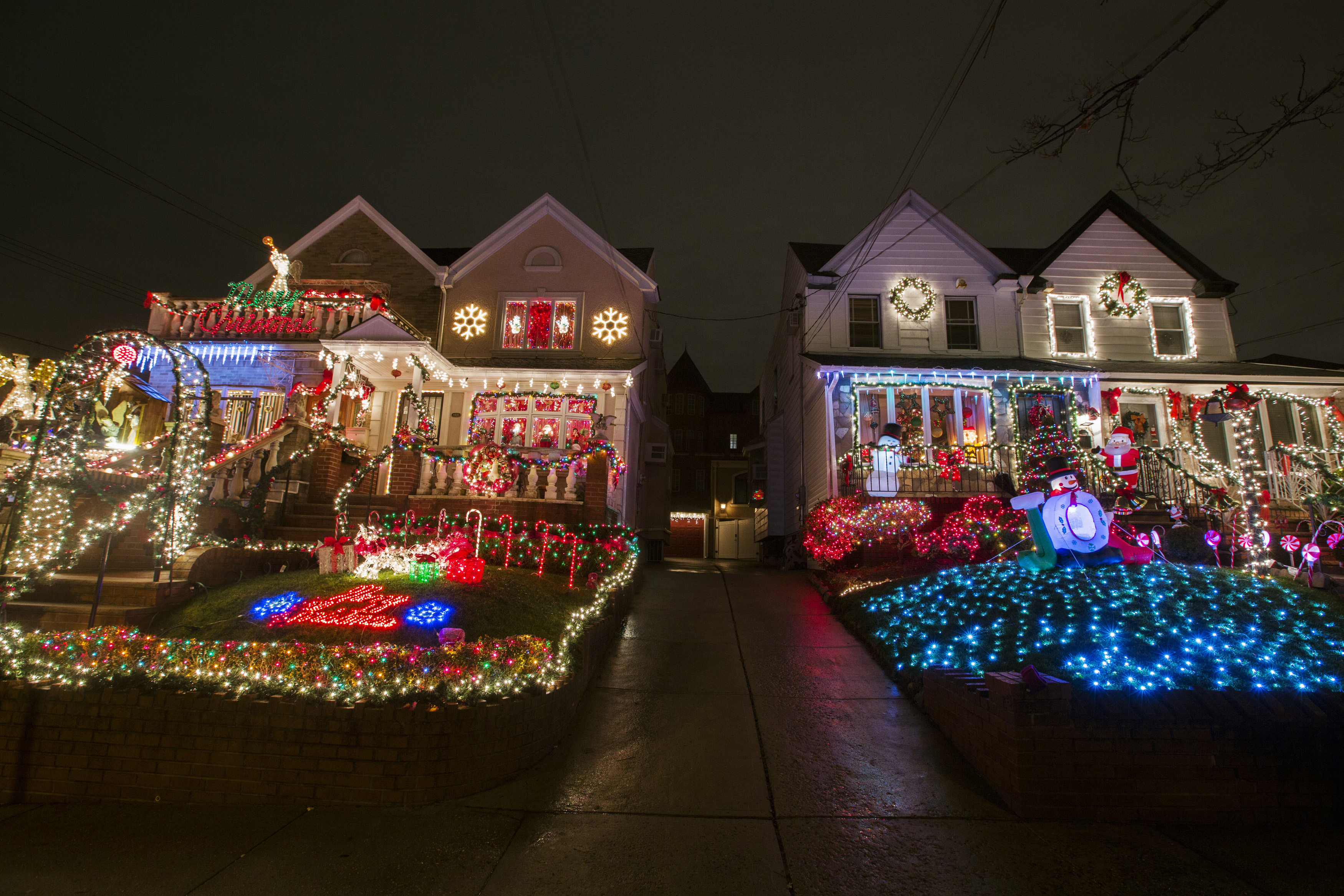 Houses in the Dyker Heights neighborhood of Brooklyn are seen lit up with Christmas decorations in New York