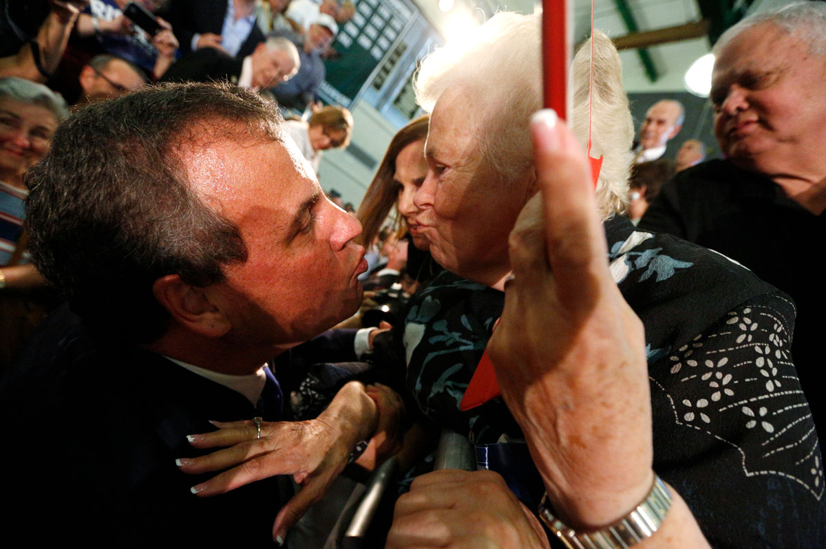 Republican U.S. presidential candidate Christie gets a kiss from a supporter during a kickoff rally in Livingston, New Jersey